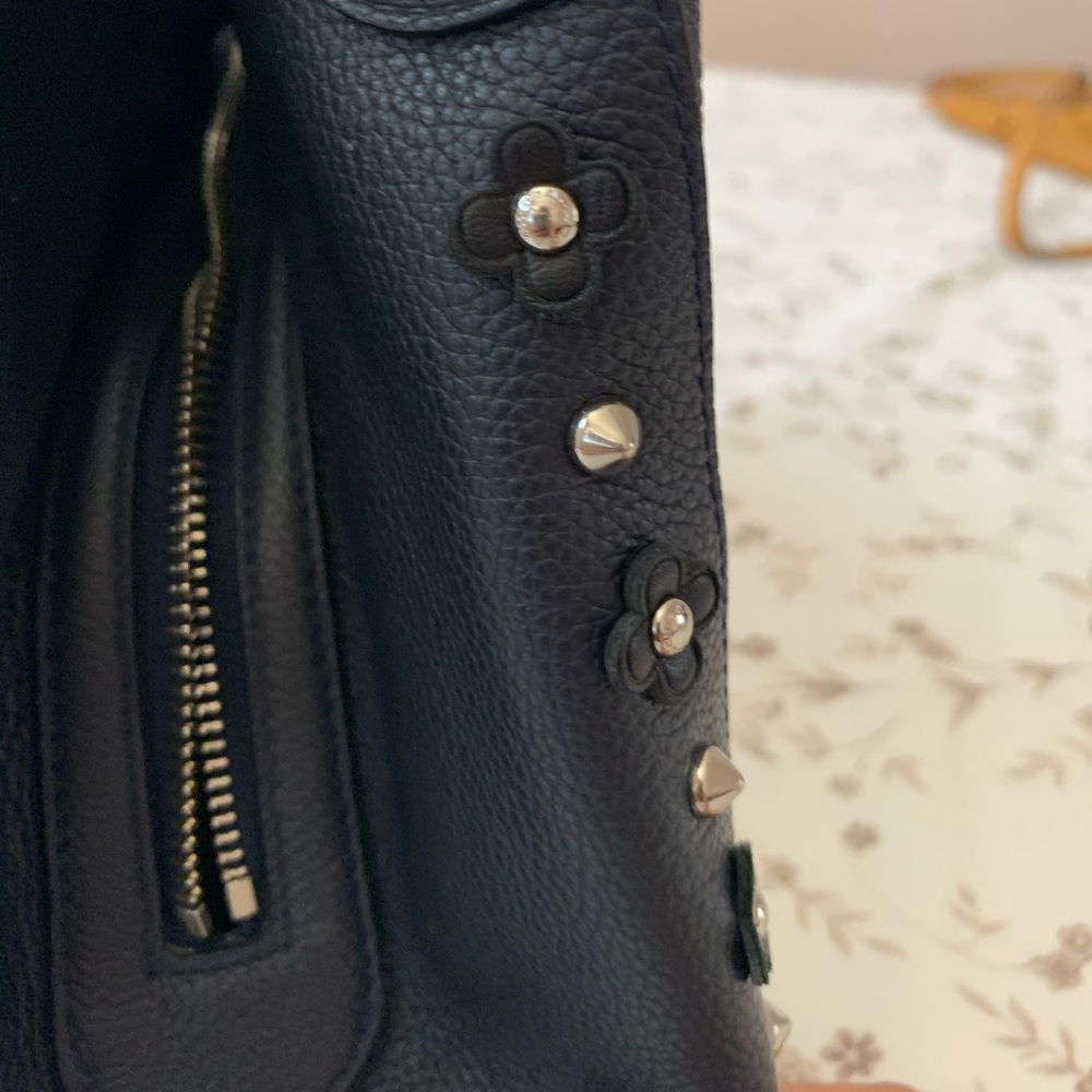 coach bag with leather flowers